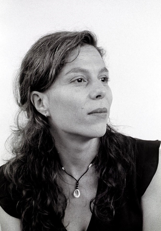 black and white headshot of Gülgün Kayim