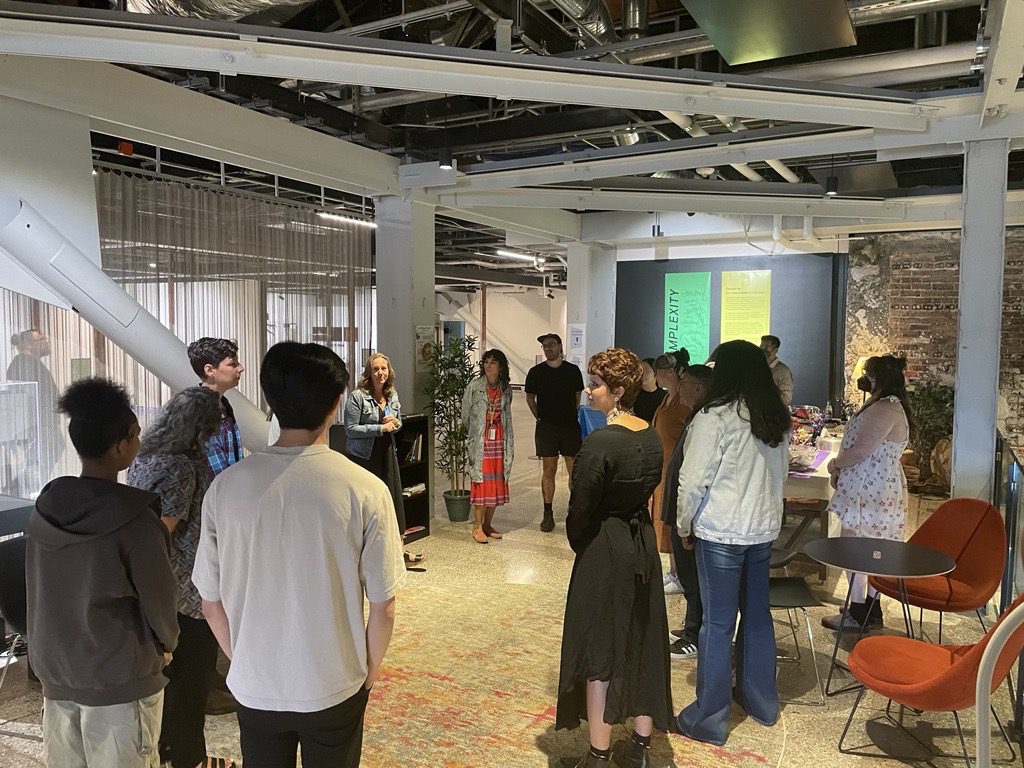 ARTS staff gathered in ARTS at King Street Station living room