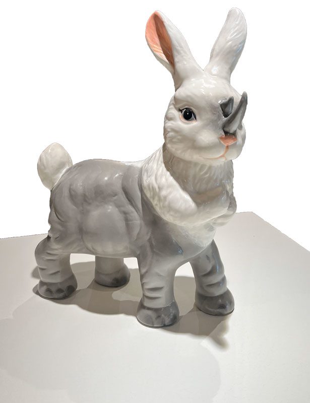 Ceramic chimera that's half fluffy bunny, half rhinoceros.