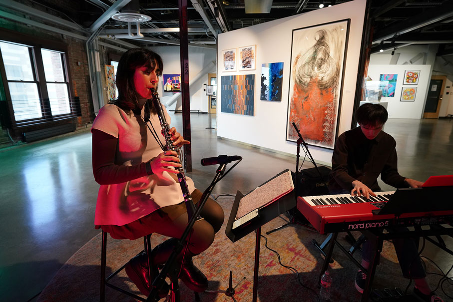 Jahnvi plays the clarinet and is accompanied by a pianist.