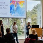 four women stand and present, reading a slide that says "Special Education and Visual Arts".