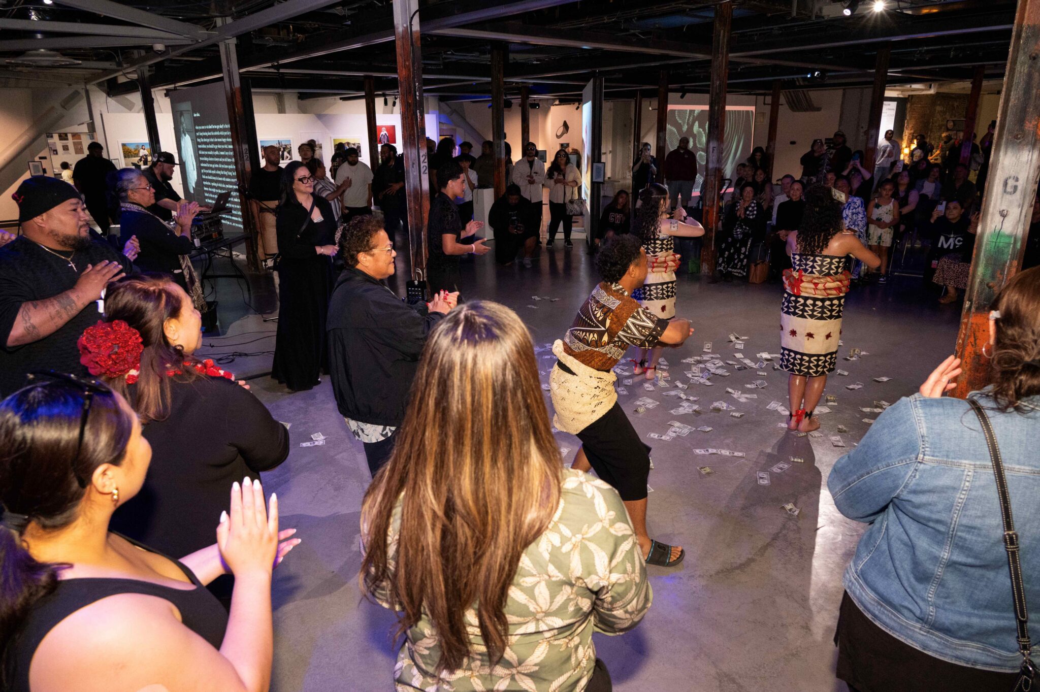 Tongan dancers perform for a large crowd