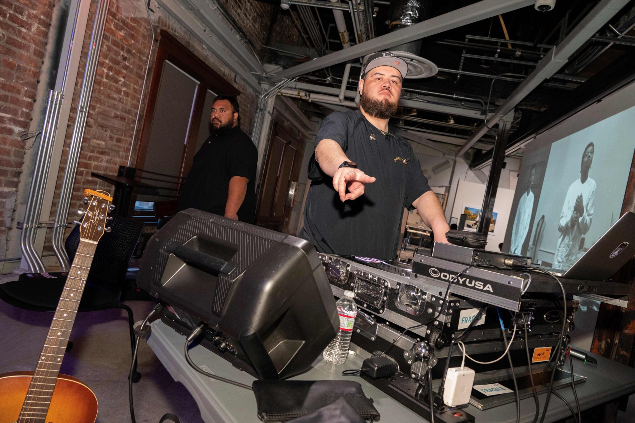 A dj gives a peace sign