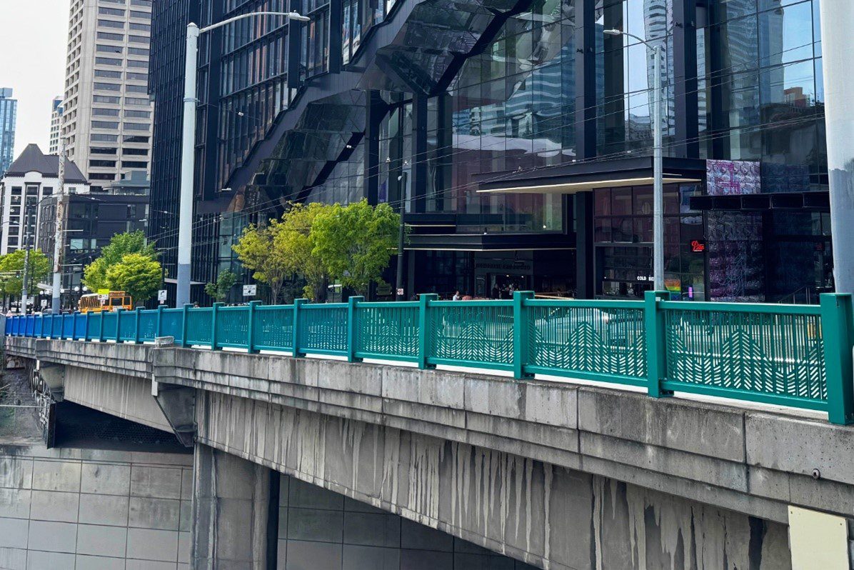 A colorful artwork in the form of a metal railing along Pike and Pine streets.