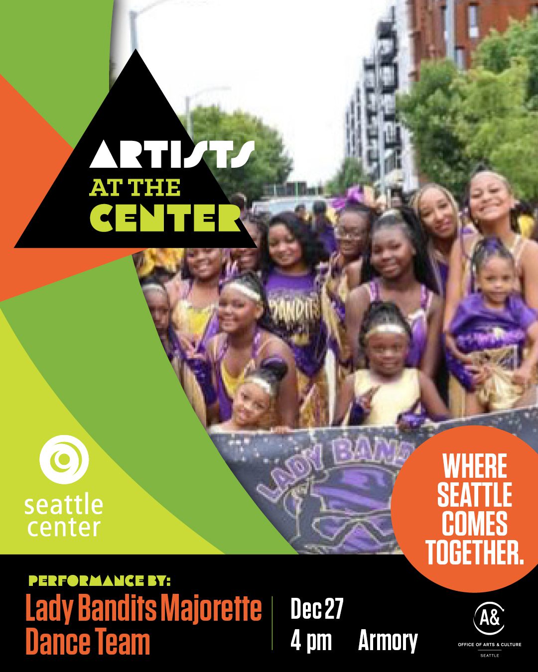 A large group of young Black girls in purple and gold dance uniforms smiling at the camera