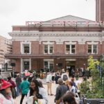 Many people gathered for an event on the King Street Station plaza