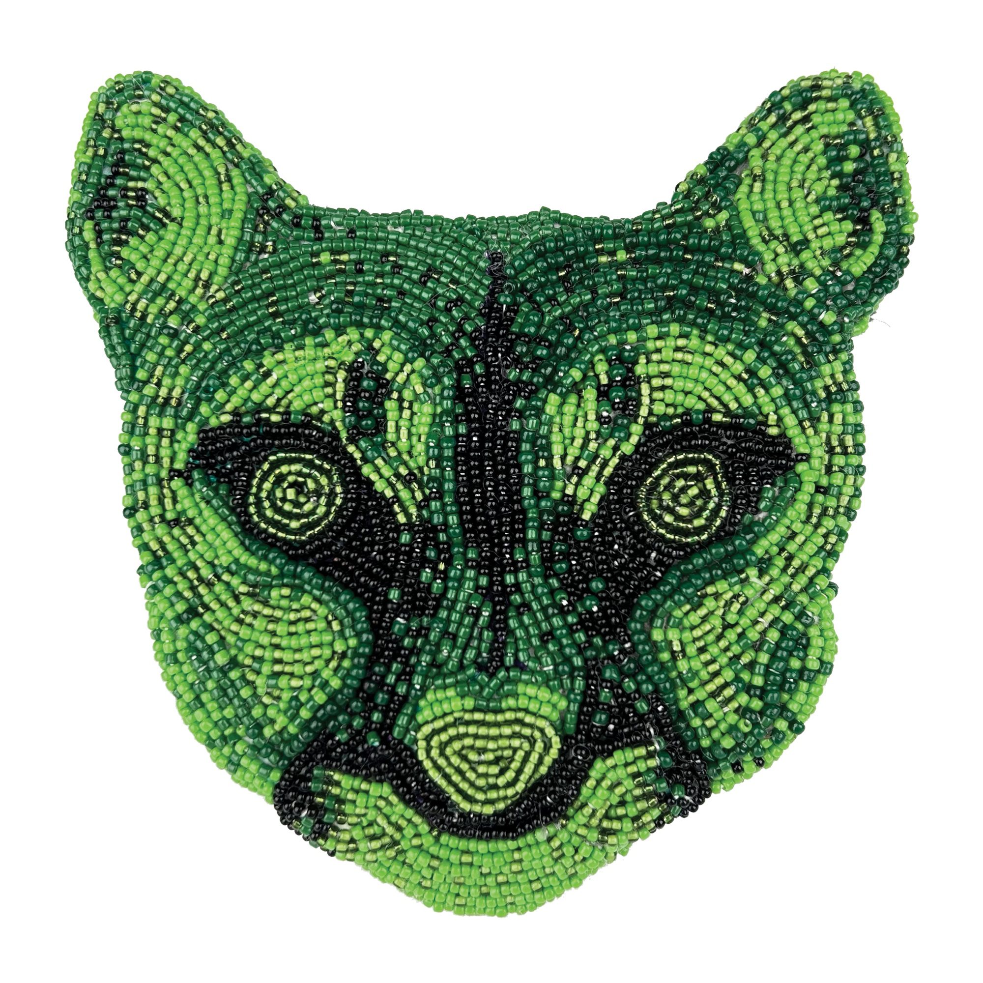 A jaguar face made out of small green beads