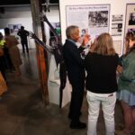 People chatting in a gallery
